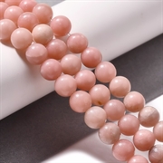 Opal  perler. Lyserød. 6 mm streng